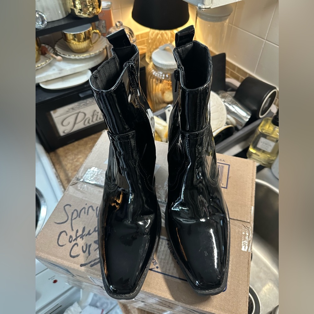 Size 8.5 patent boots.